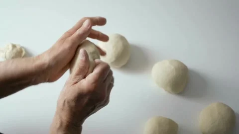 Close-up of chef hands Baker kneading bread dough home made bread productio.. Stock Footage 272470076