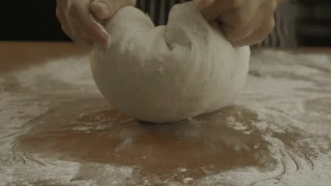 Close-up of chef hands Baker kneading bread dough home made bread productio.. Stock Footage 272470147