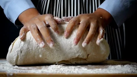Close-up of chef hands Baker kneading bread dough home made bread productio.. Stock Footage 272470221