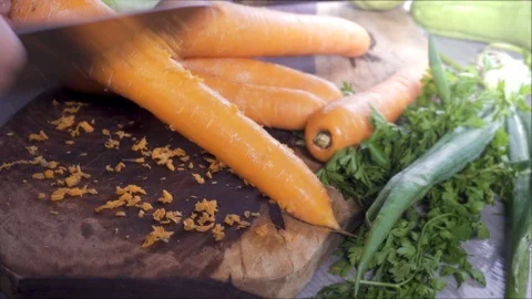 Close Up Of Chef Hands Cooking And Sliced And Grated Carrots, in The Kitchen. Stock Footage 98120866