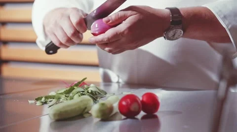Close-up of chef hands cooking food in restaurant kitchen. Slow Motion. 스톡 동영상 53897144