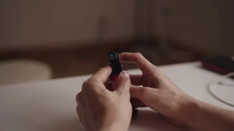 Close-up of chef hands operating gas lighter, preparing to ignite flame for Stock Footage 318470994