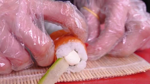 Close-up of chef hands preparing Japanese sushi food . Stock Footage 269548667