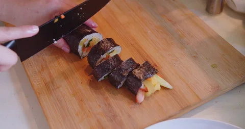 Close up chef hands using knife cutting slicing preparing homemade Korean style  Stock Footage 229970683