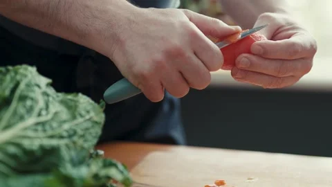 Close Up of Chef Hands Using Knife to Peel Tomato Skin for Culinary Recipe Stock-Footage 347133647