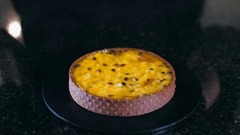 Close-up of chef is making dessert with passion fruit Stock Footage 124890513