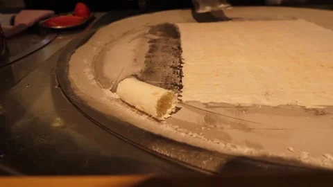 Close-up of Chef Making Fresh Rolled Ice Cream on Cold Pan Video stock 345293127