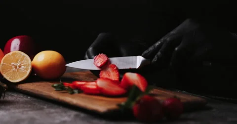 Close-up Chef Man Cuts Strawberry on Wooden Cutting Board. Healthy Ingredien 스톡 동영상 148245941