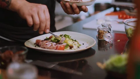Close up chef man finishing special dishes for guest of restaurant plate tasty Stock Footage 100306877