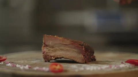 Close-up of the chef plating and serving the barbecue ribs. Stock Footage 239999739