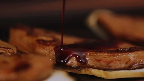Close up the chef pour the dish with the sauce bread meat in restaurant kitchen Stock Footage 100306984