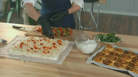 Close-up. The Chef Prepares A Cake With Cream, Nuts, and Strawberries. Stock Footage 162736576