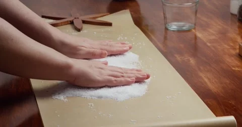 Close up of chef preparing coarse sea salt for curing salmon, spreading and Stock Footage 319658189