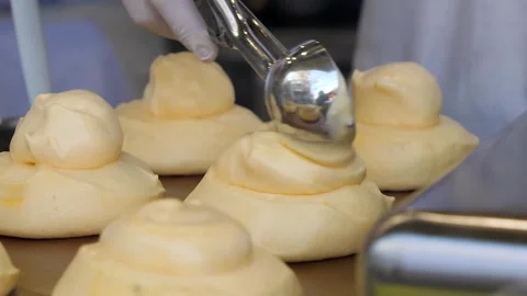 Close-up of Chef Preparing Fluffy Japanese Soufflé Pancakes on Griddle Stock Footage 331773176