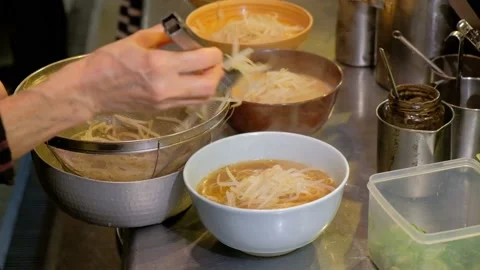 Close up of chef preparing ramen noodles in japan Stock Footage 132014543