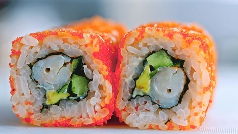 Close up of a chef preparing sushi roll in a restaurant Stock Footage 85590579