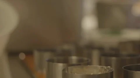 Close-up chef putting celery into cylinder Vídeos de archivo 336173858