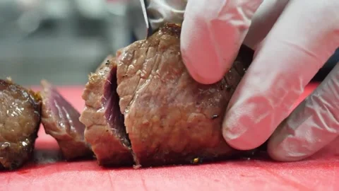 Close up of Chef Slicing Roasted Beef for Authentic Italian Pizza Topping Stock Footage 337678333