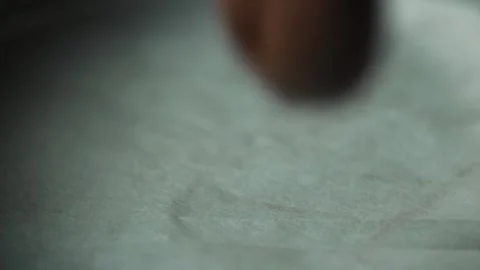 Close-up of a chef spreading chocolate cream in a metal bowl Stock Footage 131233081