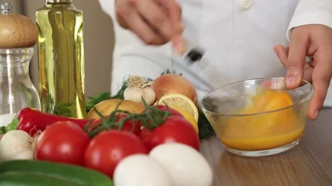 Close Up Of Chef Whisking Eggs For Cooking Stock Footage 343747038