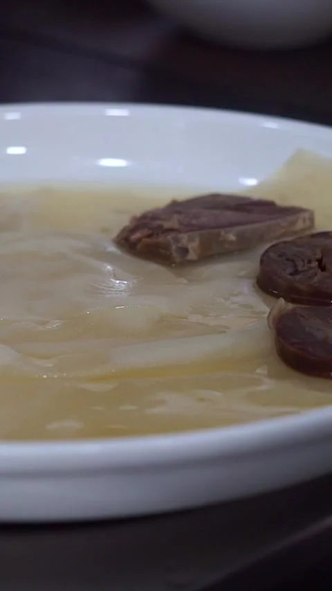 Close up of chef in white gloves arranging sliced boiled beef and kazi horsemeat Stock Footage 341352441