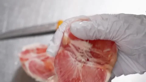 Close-up of Chef in White Gloves Handling Red Fruit Dessert Filling Stock Footage 337751267
