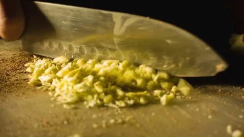 Close-up chefs hands chopping butter Vídeos de archivo 79777809