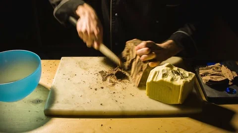 Close-up chefs hands chopping butter Video stock 79782950