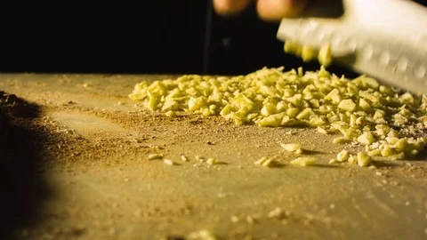 Close-up chefs hands chopping butter Video stock 79818026