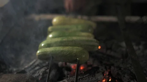 Close-up, Chef's Hands Turning Over Grill Zucchini and Stir Burning Coals Stock Footage 113148809
