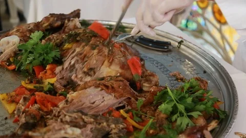 Close-up of a chef's head cut by a rabbit knife in vegetables Video stock 99366765