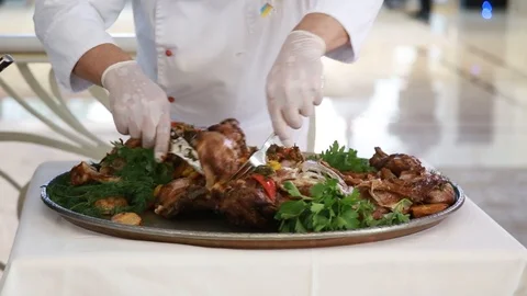 Close-up of a chef's head cut by a rabbit knife in vegetables Stock Footage 99366781