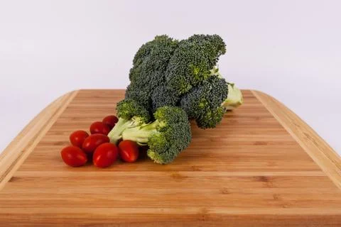 Close up cherry tomatoes and broccoli Stock Photos