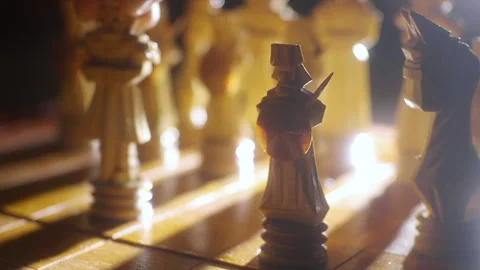 Close-up of a chess piece move. Handmade wooden chess set. Selective focus. 库存影片 149939996