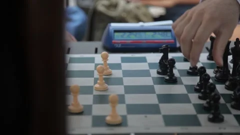 Close Up of Chess Pieces and Digital Clock During Match Vidéo 341323605