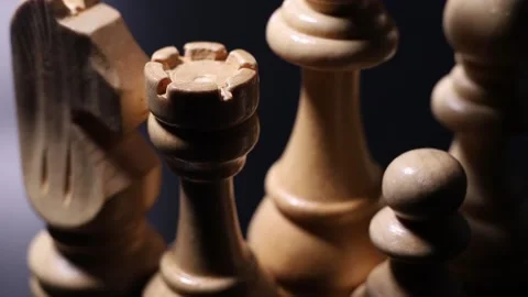 Close-up chess pieces on black background Stock Footage 170828168