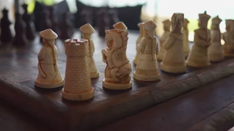 Close-up of chess pieces on board intellectual game strategy and detailed Stock Footage 312506597
