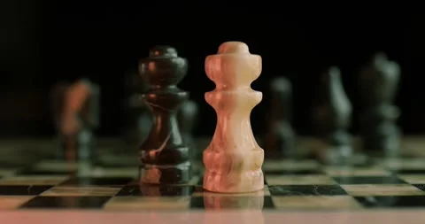 Close Up of Chess Pieces on Marble Chessboard Stock Footage 297199526