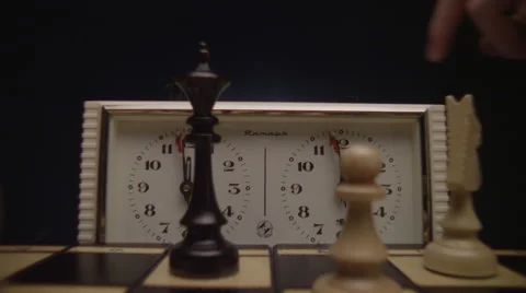 Close-Up of Chessboard with Pieces and Chess Clock Video stock 59010926