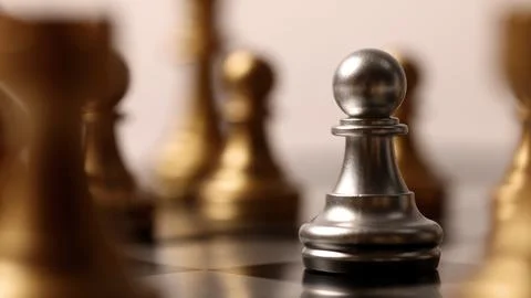 Close up chesses strategy concept of silver and gold chess on classic board. Stock Photos
