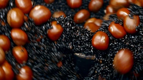 Close up: Chestnut roasting. Stock Footage
