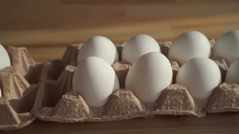 Close up chicken eggs in a cardboard box Stock-Footage 106594821