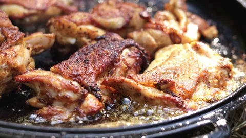 Close Up of Chicken Frying in a Pan Stock-Footage 280118758