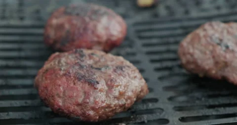 Close-up of Chicken Stuffed Meatballs Cooked on Hot Coal. Appetizing Dinner Stock Footage 132987073