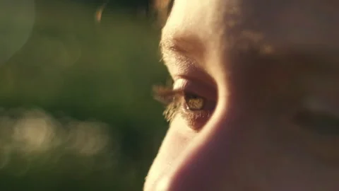 Close up of child face at sunset, beautiful blue eyes Stock Footage 276530120