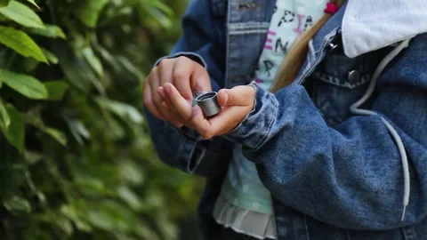 Close up of a child is hands are treating palms with an antiseptic. Stock Footage 137870091
