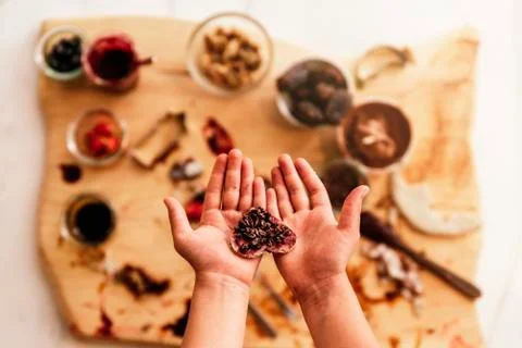 Close up of child hands preparing baking cookies. Stock Photos