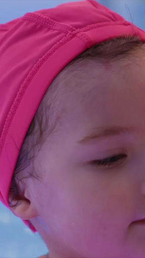 Close up child with painted nails gently touching another person shoulder in Stock Footage 345545111
