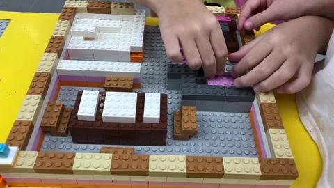 Close-Up of Child Playing with Building Blocks Stock Footage 301442191