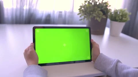 Close up Child using Digital Tablet with Green mock up Screen, Chroma Key Stock Footage 171828641